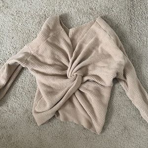 Cute sweater with front twist